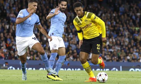 Jude Bellingham in action against Manchester City