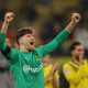 Borussia Dortmund's Gregor Kobel celebrates