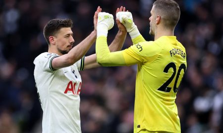 Tottenham Hotspur's Fraser Forster celebrates with Clement Lenglet