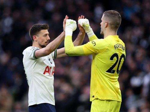 Tottenham Hotspur's Fraser Forster celebrates with Clement Lenglet