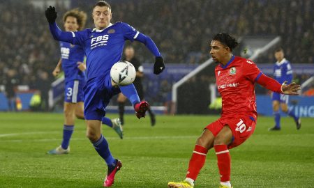 Jamie Vardy battles for Leicester City against Blackburn