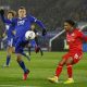 Jamie Vardy battles for Leicester City against Blackburn