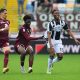 Torino star Ola Aina tussles against Udinese