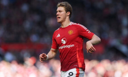 Player in red shirt runs.