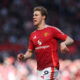 Player in red shirt runs.