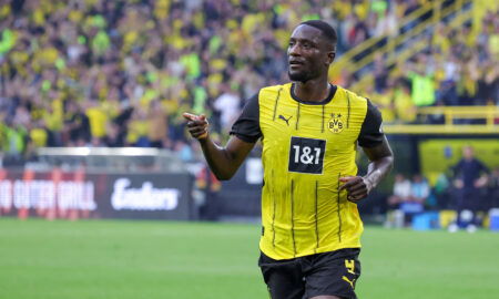 Soccer player in yellow jersey.