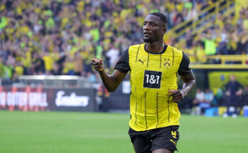 Soccer player in yellow jersey.