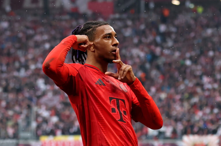 LEIPZIG, GERMANY - MAY 03: Michael Olise of Bayern Munich celebrates scoring his team's second goal during the Bundesliga match between RB Leipzig and FC Bayern München at Red Bull Arena on May 03, 2025 in Leipzig, Germany. (Photo by Maja Hitij/Getty Images)