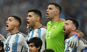 Argentina's Lionel Messi, Emiliano Martinez, Cristian Romero and Nahuel Molina. (REUTERS/Dylan Martinez)