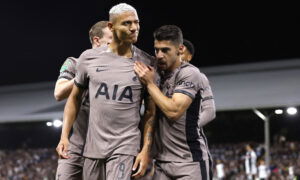 Spurs players celebrate goal.