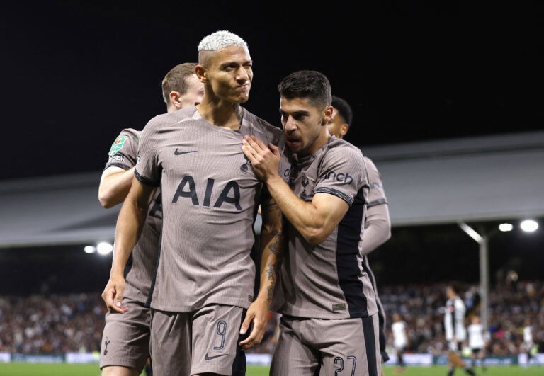 Spurs players celebrate goal.