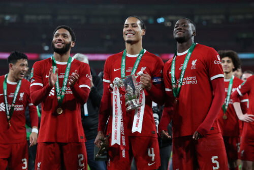 Liverpool players with trophy.