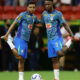 Rodrygo and Vinicius Jr. warm up.