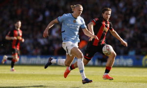 Manchester City's Erling Haaland in action with AFC Bournemouth's Illia Zabarnyi. (REUTERS)/Andrew Couldridge)