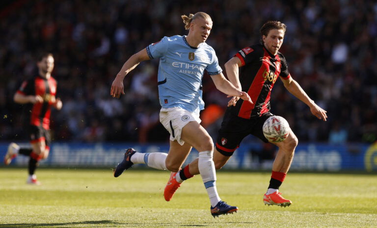 Manchester City's Erling Haaland in action with AFC Bournemouth's Illia Zabarnyi. (REUTERS)/Andrew Couldridge)