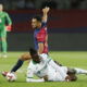 Barcelona's Eric Garcia in action with Getafe's Christantus Uche. (REUTERS/Albert Gea)