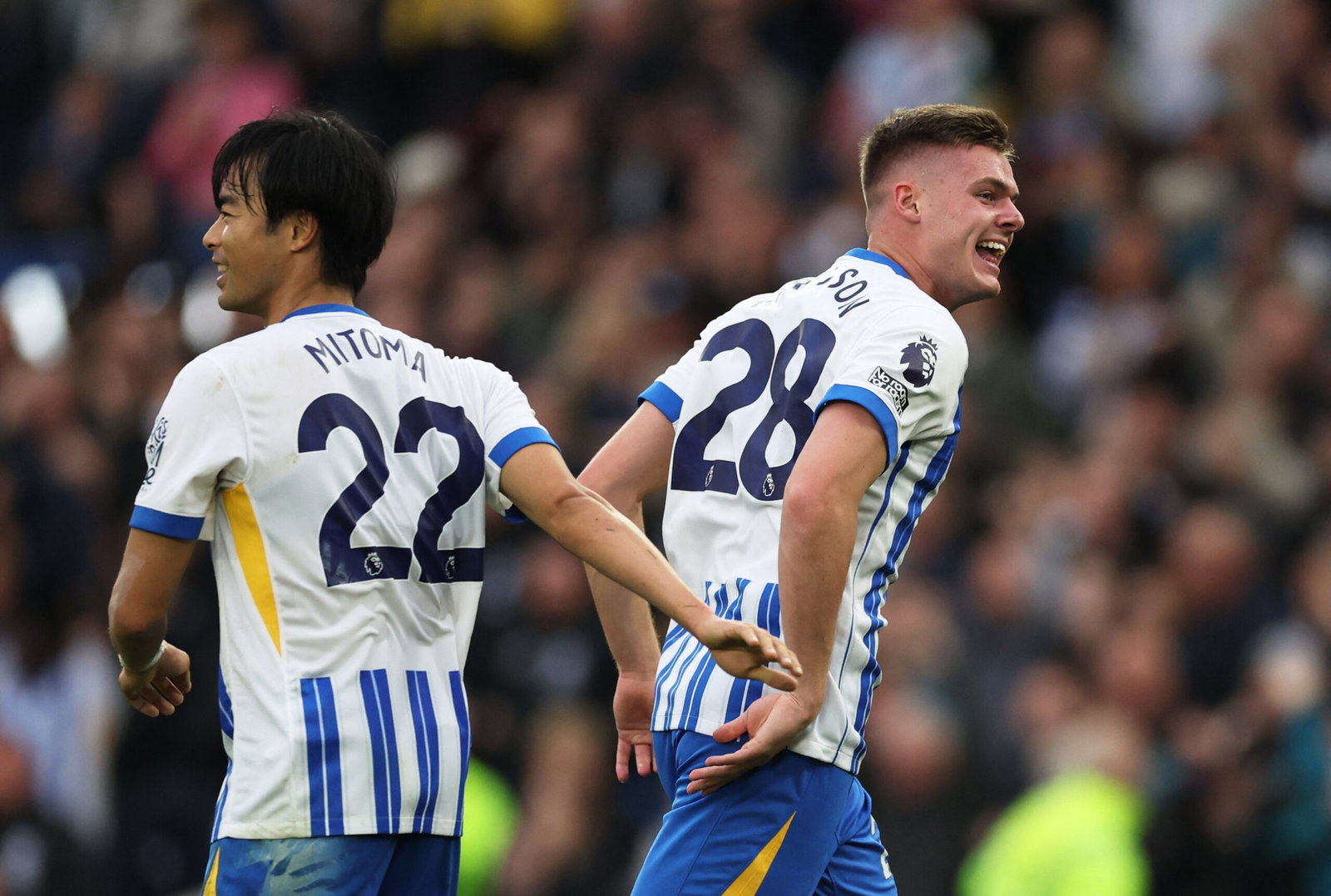 Evan Ferguson, Kaoru Mitoma. (Action Images)