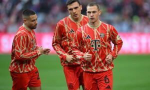 Bayern Munich's Joshua Kimmich, Joao Palhinha and Raphael Guerreiro. (REUTERS/Angelika Warmuth)