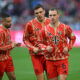 Bayern Munich's Joshua Kimmich, Joao Palhinha and Raphael Guerreiro. (REUTERS/Angelika Warmuth)