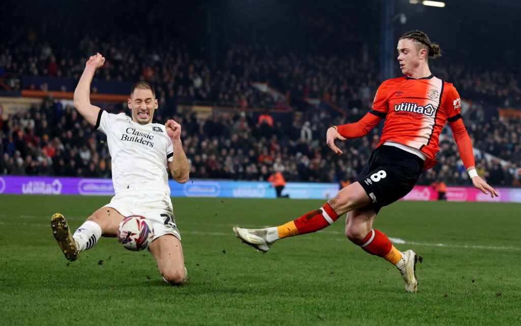 Luton Town's Thelo Aasgaard in action with Plymouth Argyle's Nikola Kati. (Action Images/Paul Childs)