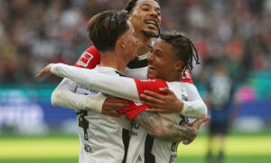 Eintracht Frankfurt's Robin Koch, Hugo Ekitike, and Jean-Matteo Bahoya. (REUTERS/Kai Pfaffenbach)