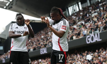 Alex Iwobi, Calvin Bassey. (REUTERS/Paul Childs)