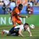 England's Elliot Anderson in action with Netherlands' Jorrel Hato. (REUTERS/Radovan Stoklasa)