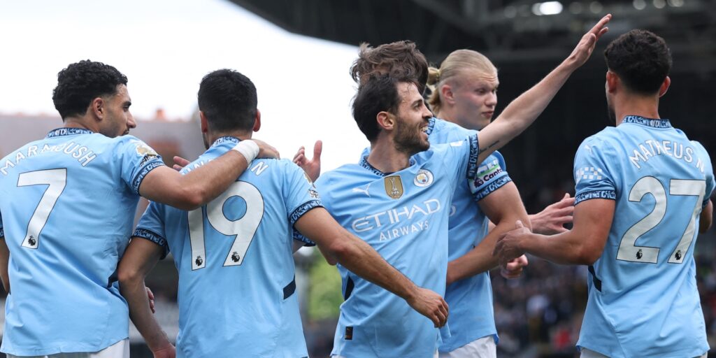 Manchester City celebrate a goal in the Premier League.