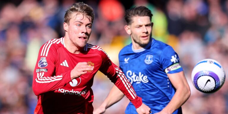 Man Utd's Rasmus Hojlund and Everton's James Tarkowski during a Premier League match.