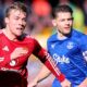 Man Utd's Rasmus Hojlund and Everton's James Tarkowski during a Premier League match.