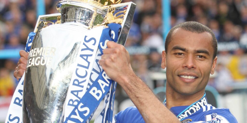 Chelsea defender Ashley Cole with the Premier League trophy.
