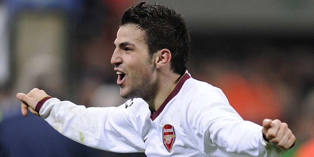 Arsenal midfielder Cesc Fabregas celebrates scoring a goal in the Champions League.
