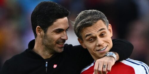 Mikel Arteta and Leandro Trossard of Arsenal