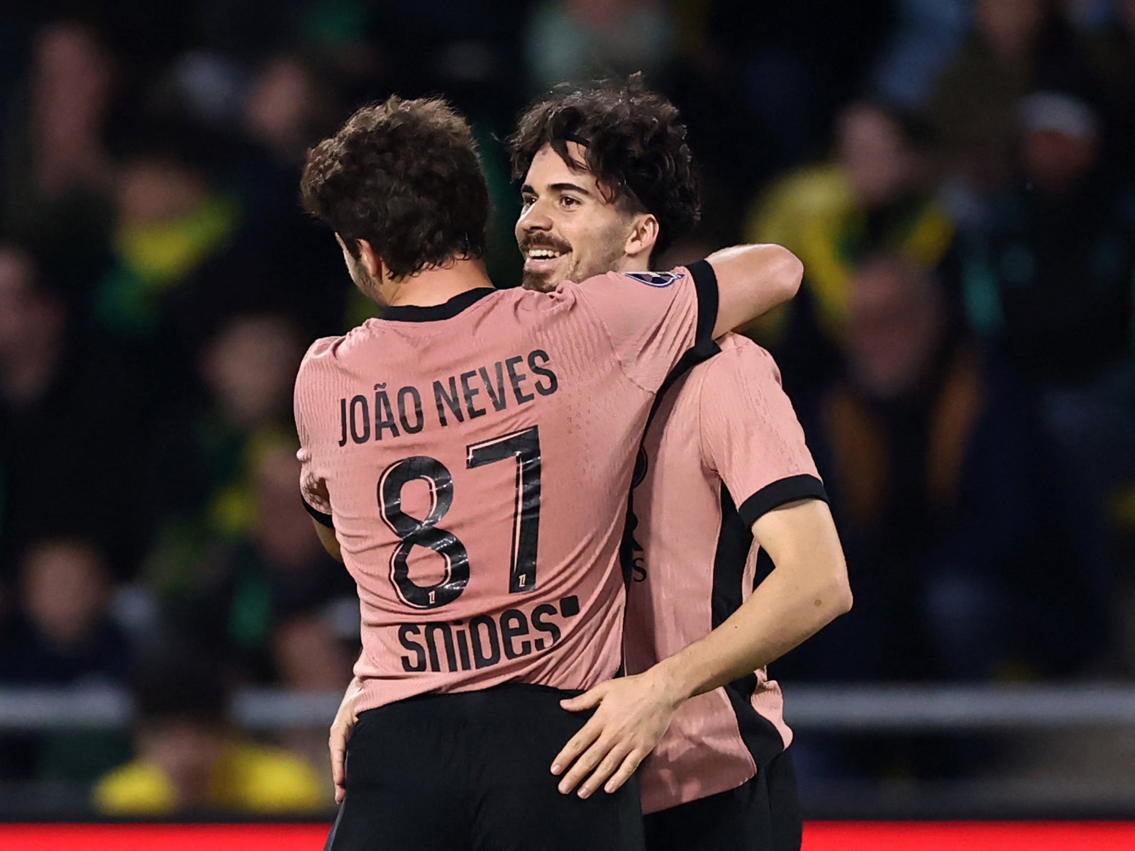 Paris St Germain's Vitinha celebrates with Joao Neves. (REUTERS/Stephane Mahe)