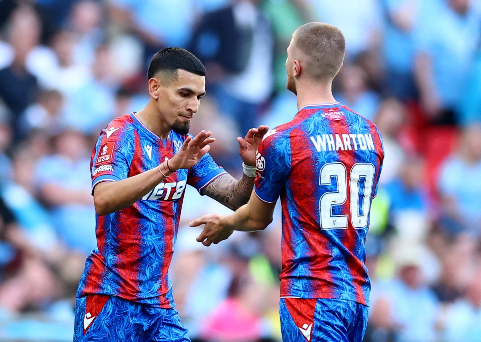 Crystal Palace's Adam Wharton and Daniel Munoz. (Reuters/Andrew Boyers)