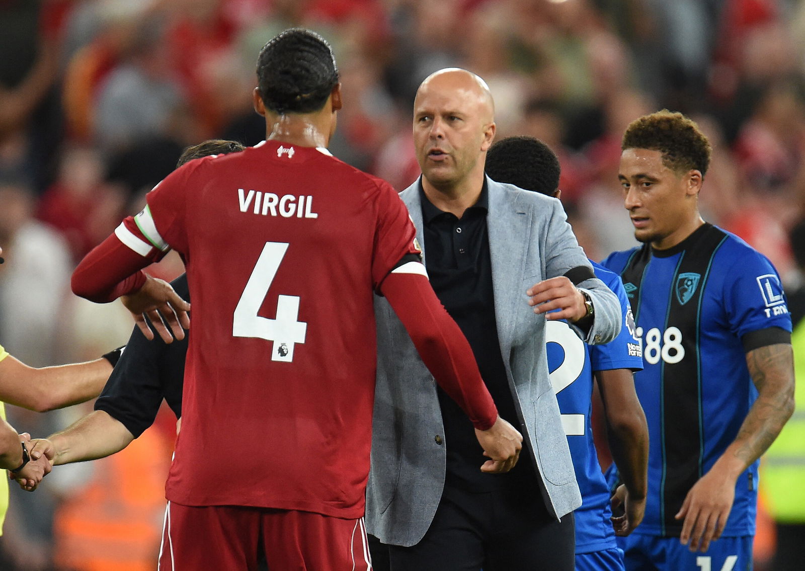Liverpool manager Arne Slot with Virgil van Dijk. (REUTERS/Peter Powell)