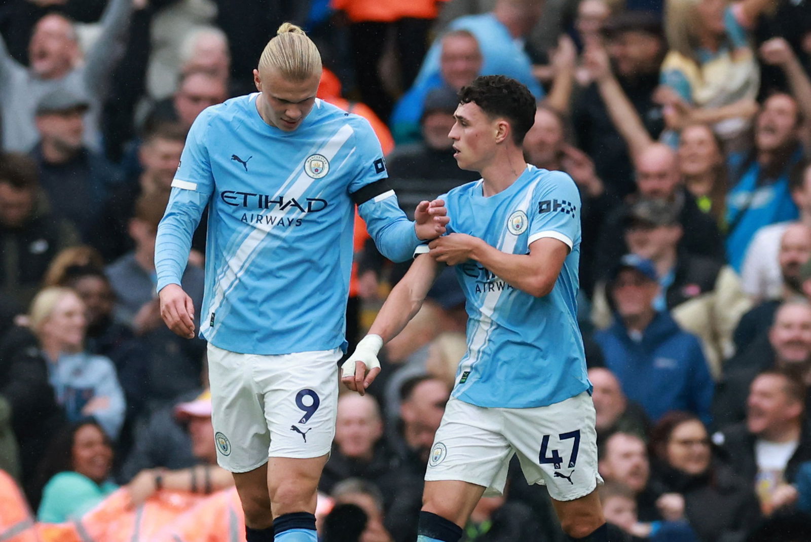 Phil Foden, Erling Haaland. (REUTERS/Phil Noble)