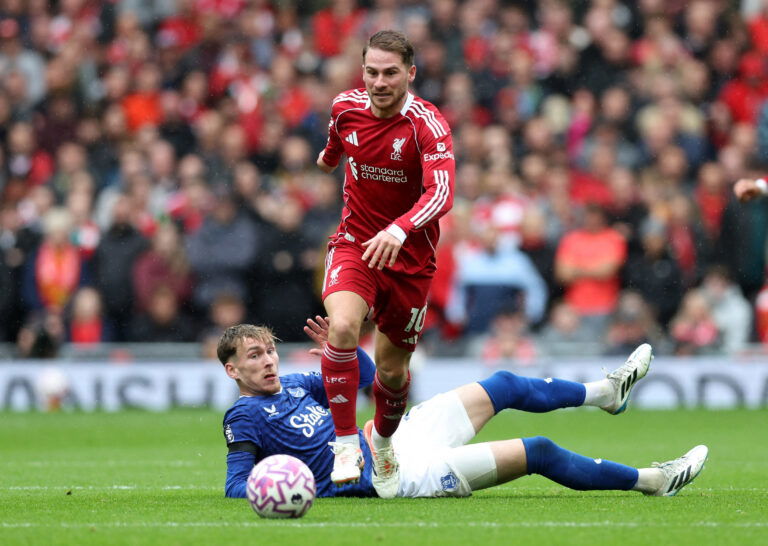 Everton's James Garner in action with Liverpool's Alexis Mac Allister. (REUTERS/David Klein)