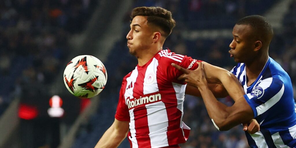 New Brighton signing Charalampos Kostoulas playing for Olympiacos.