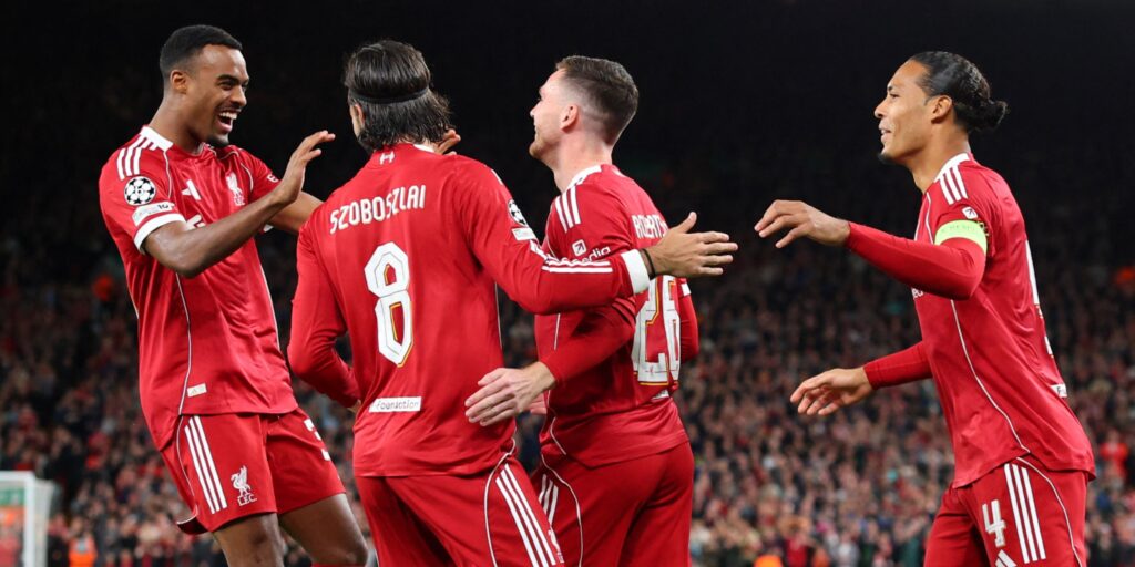 Liverpool celebrate scoring a goal in the Champions League.
