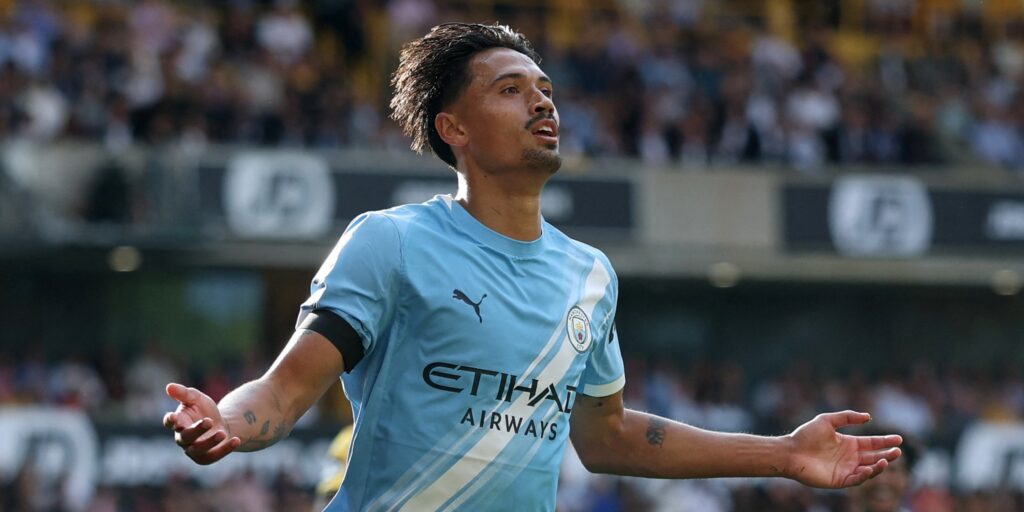 Man City midfielder Tijjani Reijnders celebrates during a Premier League match.