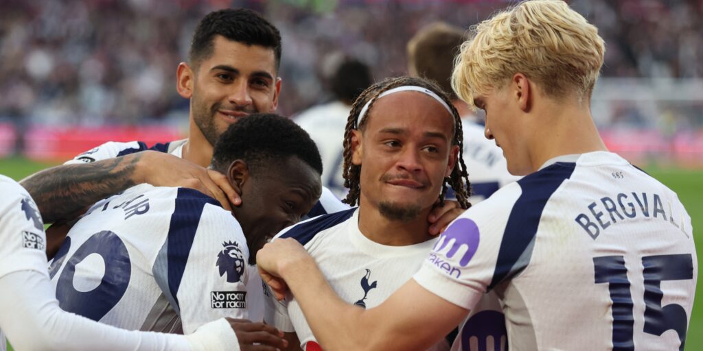 Spurs' Xavi Simons celebrates a goal with his teammates.