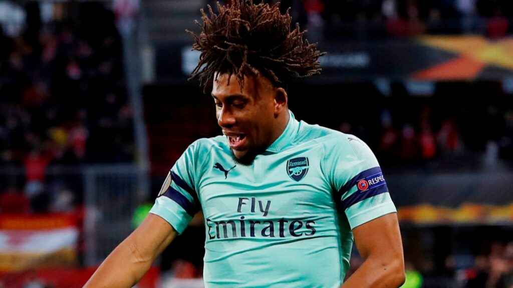 Arsenal midfielder Alex Iwobi celebrates during a match.