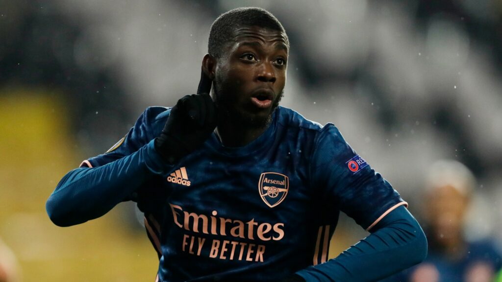 Arsenal winger Nicolas Pepe celebrates during a match.