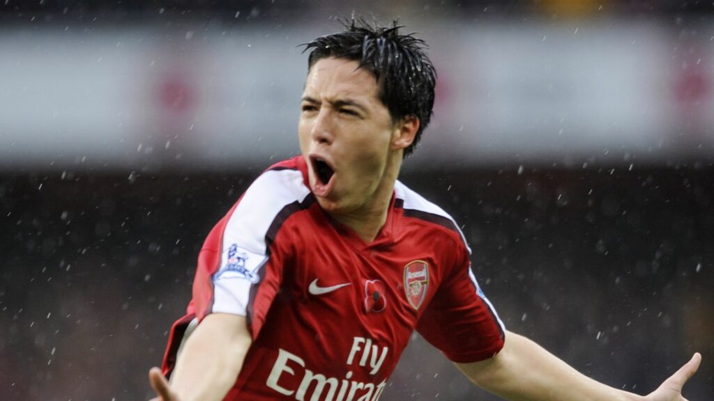 Arsenal midfielder Samir Nasri celebrates during a match.