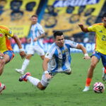 Argentina's Marcos Acuna in action with Colombia's Daniel Munoz. (REUTERS/Luisa Gonzalez)