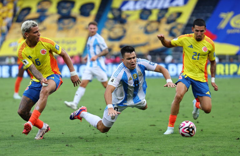 Argentina's Marcos Acuna in action with Colombia's Daniel Munoz. (REUTERS/Luisa Gonzalez)