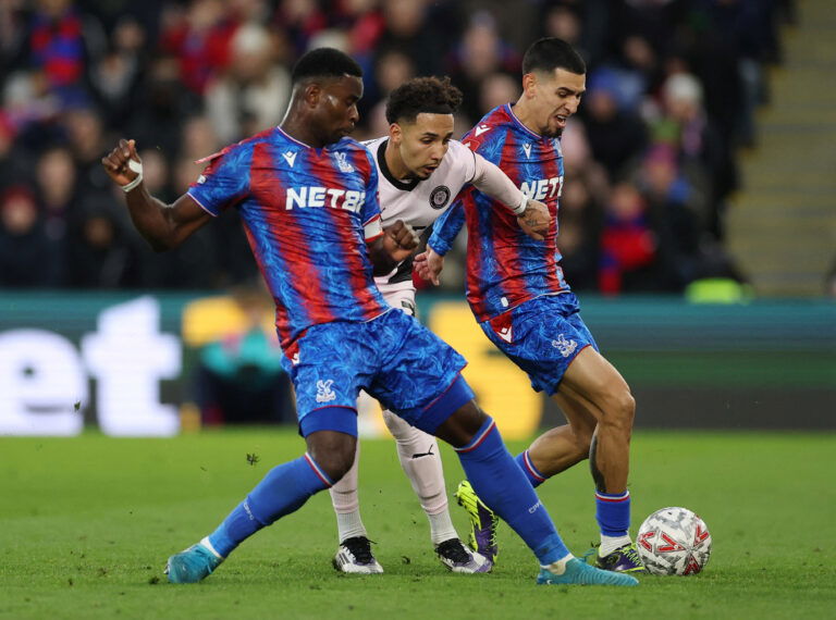 Stockport County's Odin Bailey in action with Crystal Palace's Daniel Munoz and Marc Guehi. (REUTERS/Toby Melville)