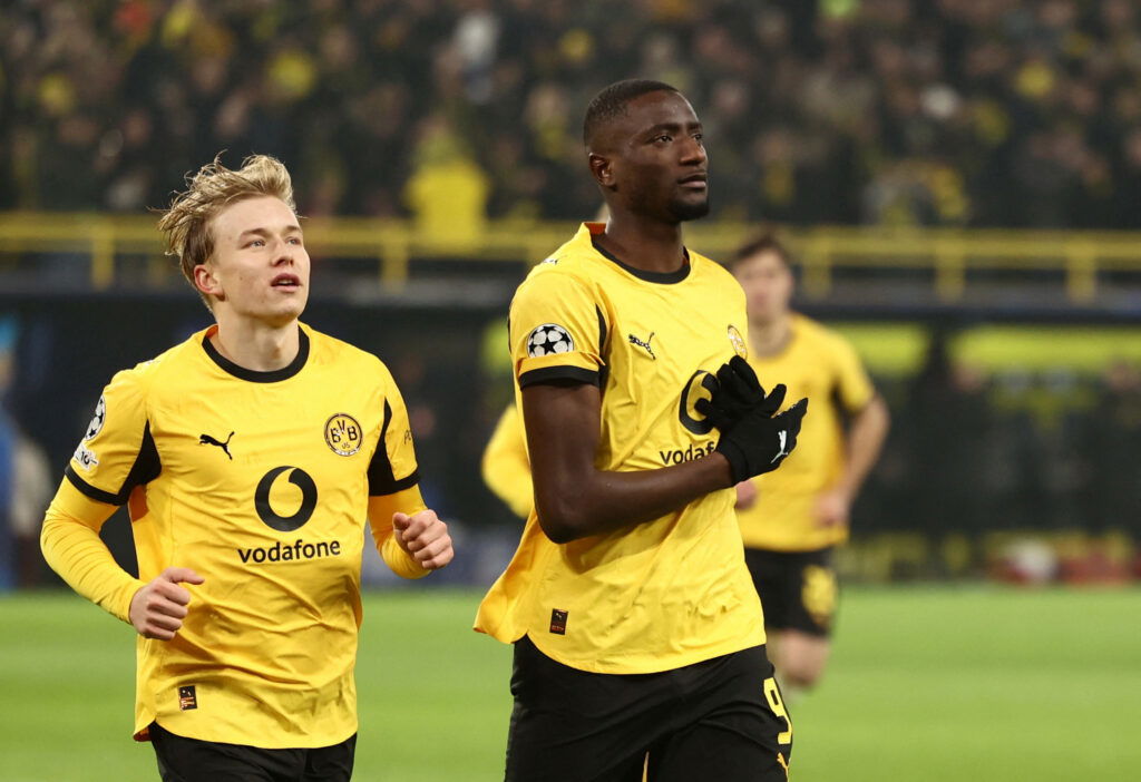 Borussia Dortmund's Serhou Guirassy and Daniel Svensson. (REUTERS/Leon Kuegeler)