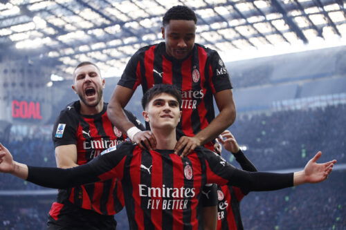 AC Milan's Davide Bartesaghi celebrates scoring their second goal with Christopher Nkunku and Strahinja Pavlovic. (REUTERS/Alessandro Garofalo)